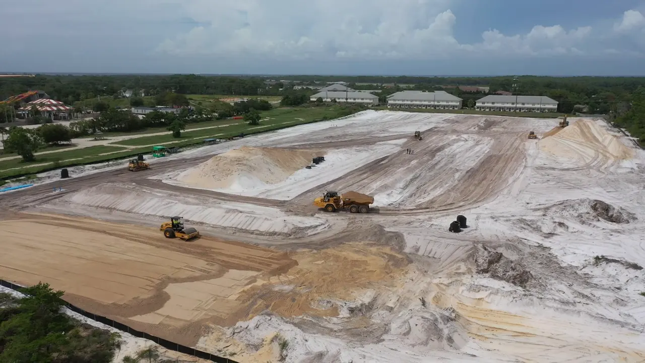 Aerial view of an Emerald Coast construction project from our background video